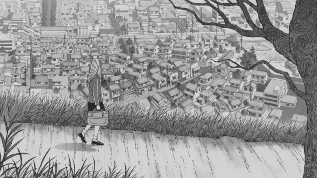 Image from Junji Ito's Uzumaki: A girl walking down a hill looking at the houses below.